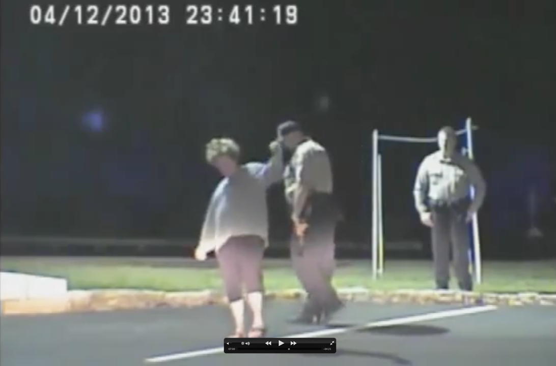 Rosemary Lehmberg falling-down-drunk: Travis County District Attorney Rosemary Lehmberg at a traffic stop for DWI on April 12, 2013, almost falling.; Austin; Travis County
