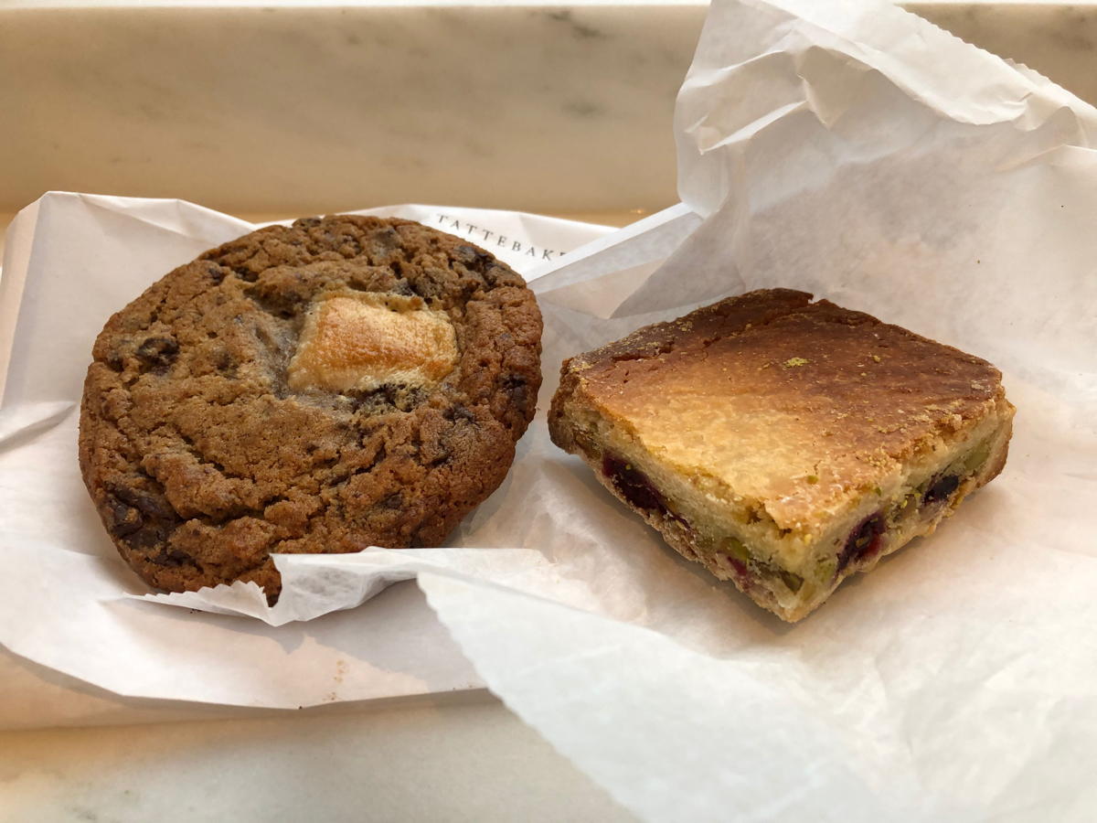 Tatte Pistachio Cherry: Halva cookie and a pistachio-cherry bar. The bar is upside down. Symbolism.; Washington, DC; pastries