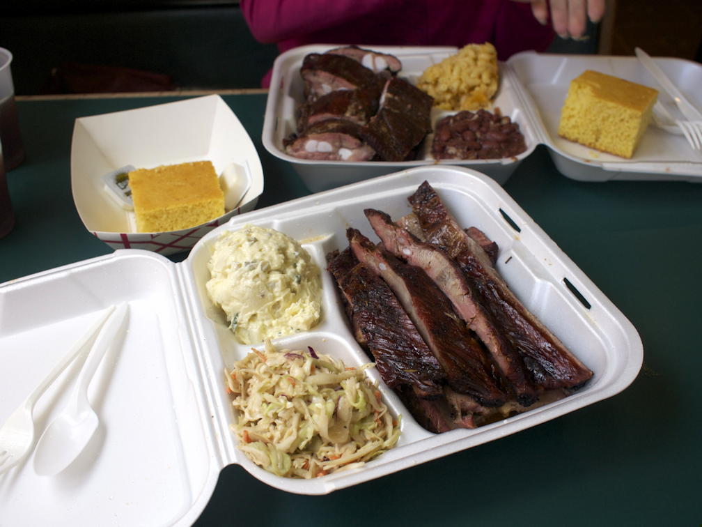 Coops West Texas meats: Pork rib, tri-tip, brisket, and West Texas sausage, with coleslaw, potato salad, red beans and rice, and mac and cheese.; restaurants; barbeque; barbecue, BBQ, grill