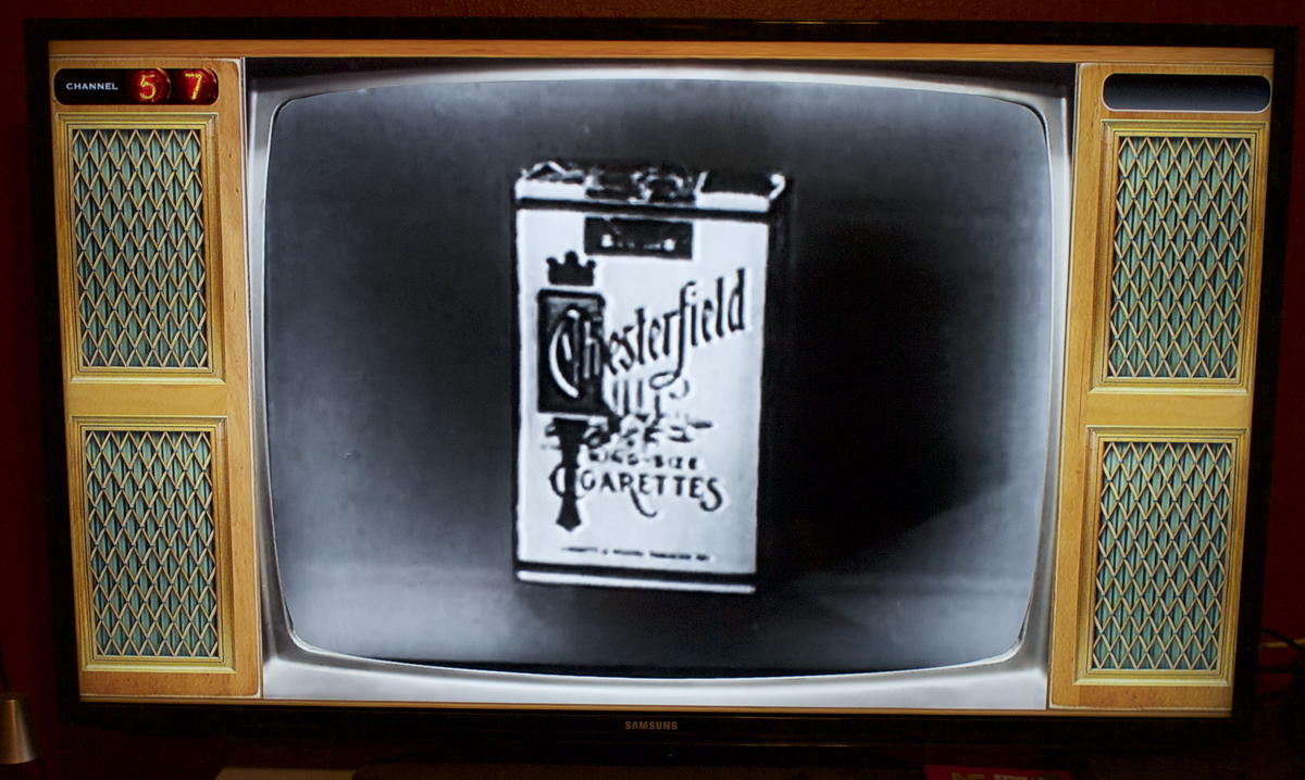 TVTimeWarp Chesterfields: TVTimeWarp on the Apple TV displays an ad for Chesterfield cigarettes.; Apple TV; tvOS apps; cigarettes