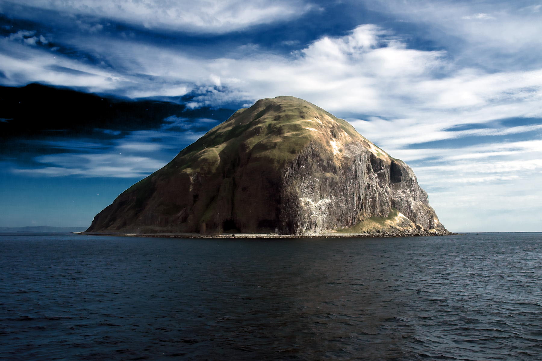 Ailsa Craig, Scotland: “The round Ailsa Craig on the Waverley Paddle Steamer returning to Ayr. It is an island in the outer Firth of Clyde, Scotland where granite was quarried to make curling stones.”; islands; Scotland