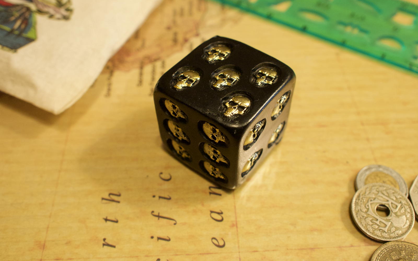 Skull d6: A six-sided die with skulls for pips.; dice