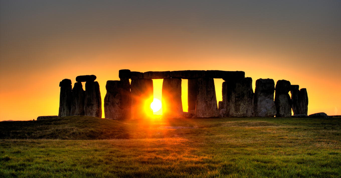 Sun Behind Stonehenge: “Stonehenge in your face, taken on December 27, 2008 by Simon Wakefield.”; Stonehenge; sunset