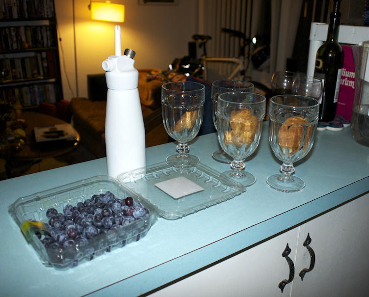 Biscuits and blueberries: Preparation for biscuits in blueberry syrup.; blueberries; biscuits