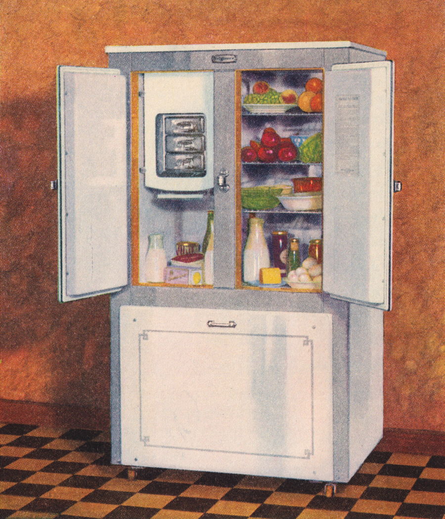 Frigidaire Refrigerator: A vintage Frigidaire refrigerator looking like a cupboard. From the 1928 Frigidaire Recipes.; refrigerators; Frigidaire