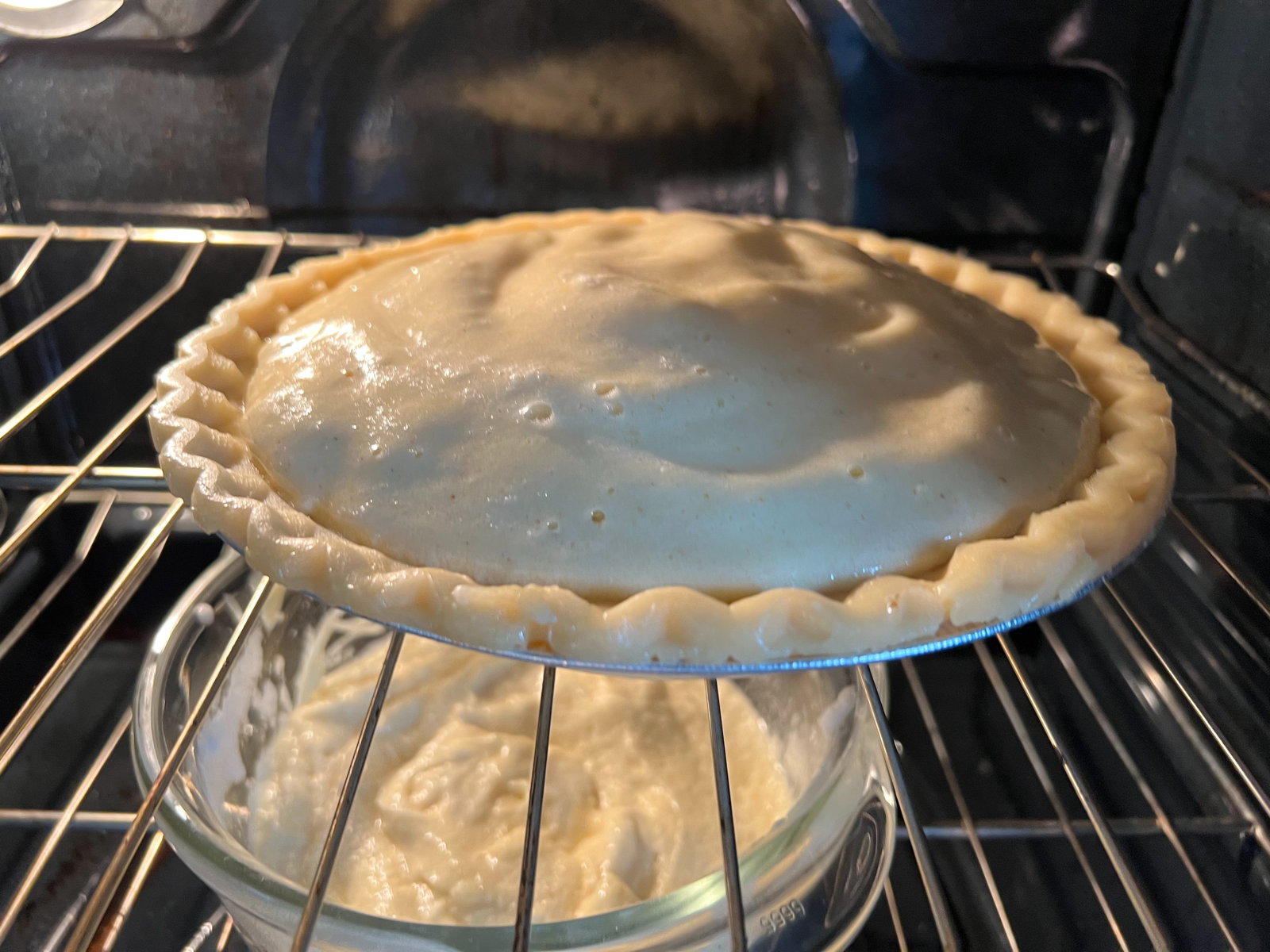 Potato pie in oven: Irish Potato Pie, from the ca. 1877 Horsford Cook-Book, rising in the oven.; pie; potatoes; America’s Centennial; 1876; Rumford Chemical Works; ovens