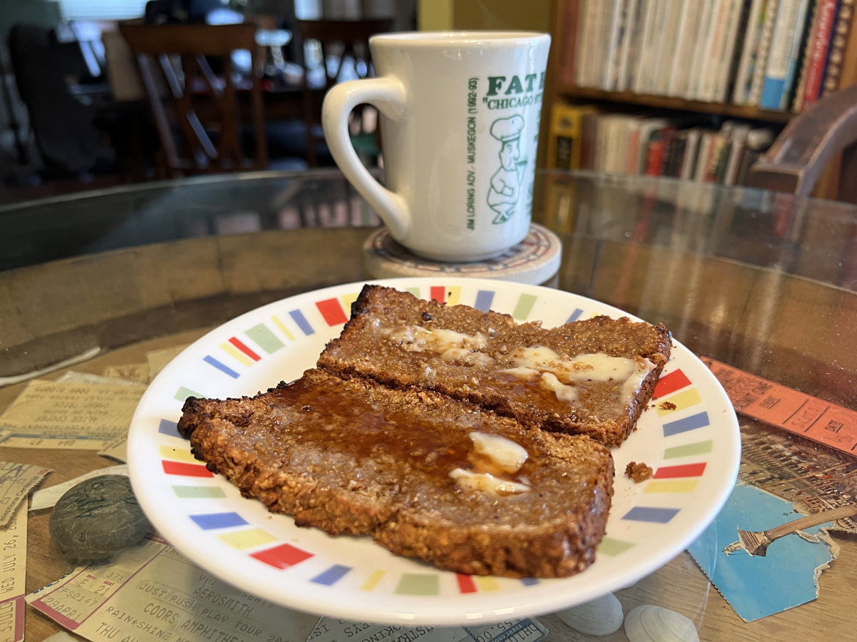 Health bread toast with boiled cider: Karen Andrie’s Health Bread from the 2012 Heritage Cookbook, toasted and buttered with boiled apple cider.; bread; Muskegon; boiled cider