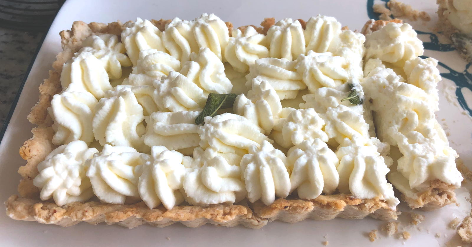Sage pudding tart with lavender cream