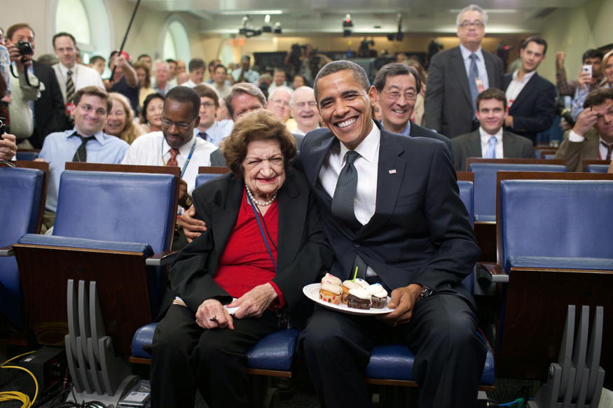 Barack Obama and Helen Thomas: “President Barack Obama presents cupcakes with a candle to Hearst White House columnist Helen Thomas in honor of her birthday in the James Brady Briefing Room, on Aug. 4, 2009. Thomas, who turned 89, shares the same birthday as the President, who turned 48.”; journalism; Barack Obama; Helen Thomas