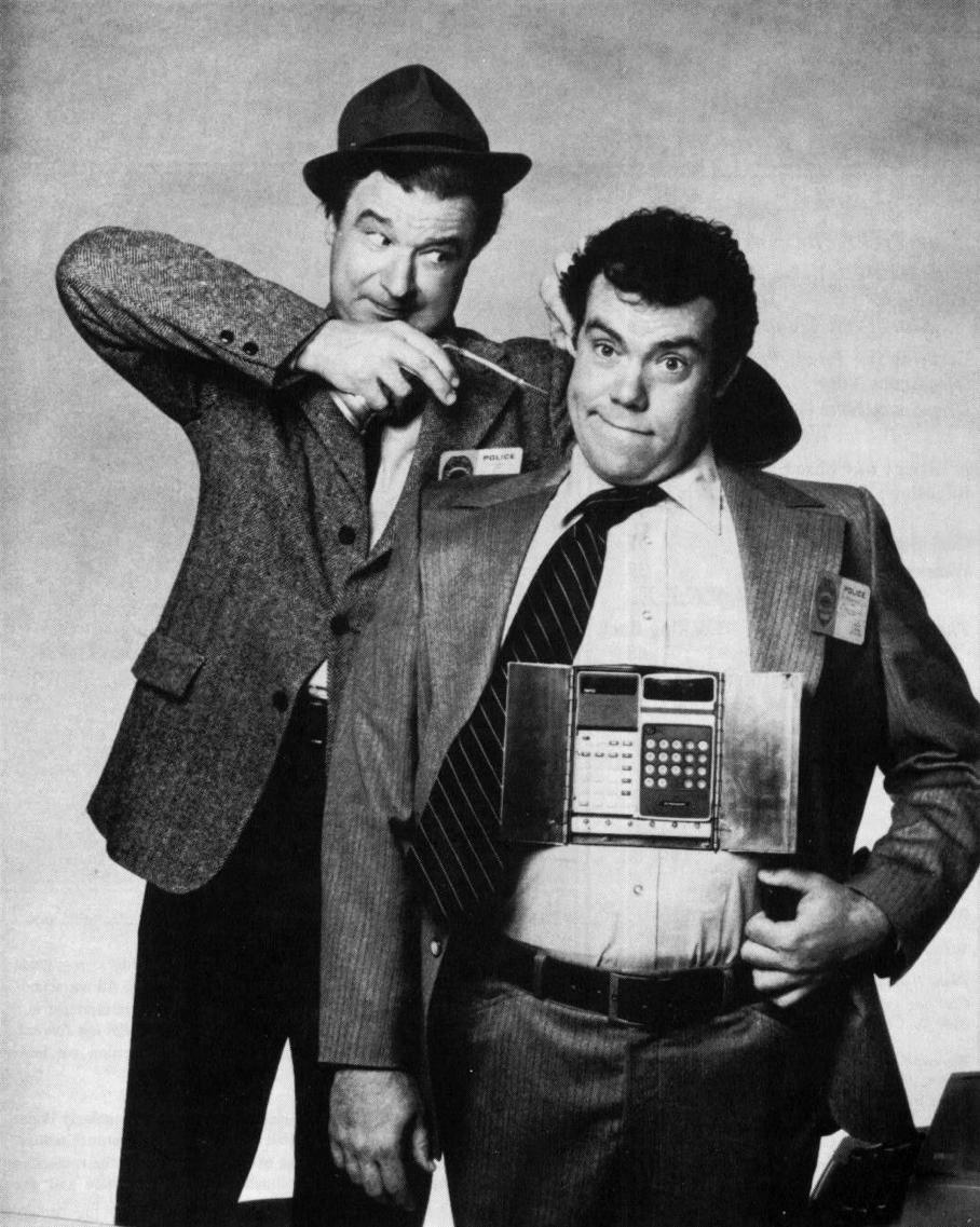 Holmes & Yoyo: “The cast of Holmes and Yoyo. Richard B. Shull as Detective Alexander Holmes and John chuck as Gregory Yoyonovich, Holmes’ mechanical partner named ‘Yoyo’.”; seventies; 1970s; television