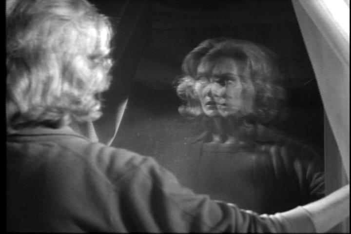 Double Reflections: Mary Henry looks out her window and sees two reflections of herself.; movies