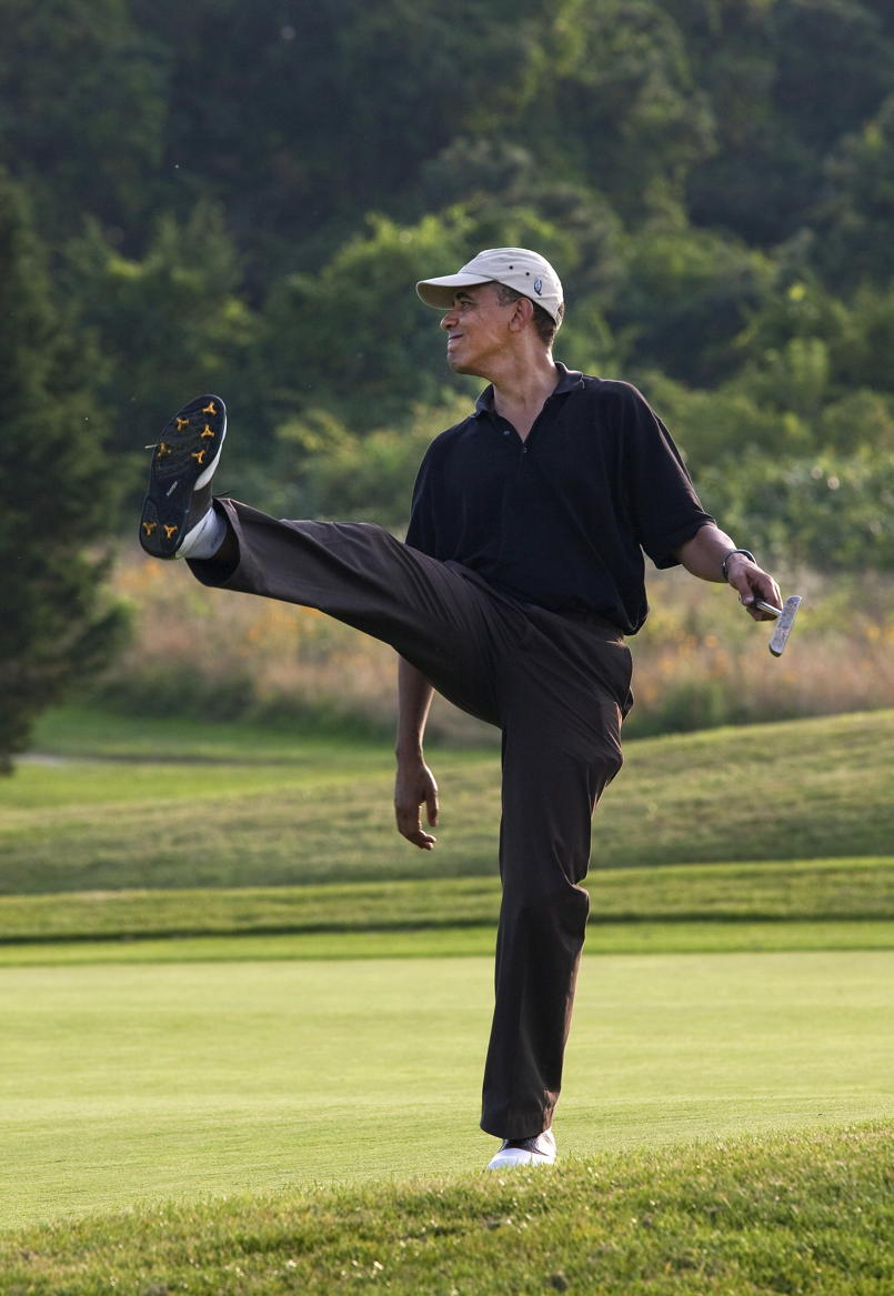 President Obama golfs: “President Barack Obama puts a little body English on his shot during a round of golf at Farm Neck golf course during his vacation on Martha&#39;s Vineyard, Aug. 24, 2009.”; Barack Obama; golf