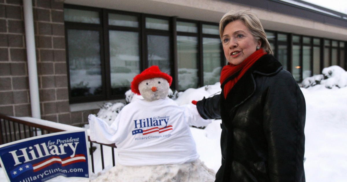 Hillary Clinton in snow: “Hillary Clinton stands next to a snowman built by supporters as she campaigns, Dec. 31, 2007.”; Election 2008; Hillary Clinton