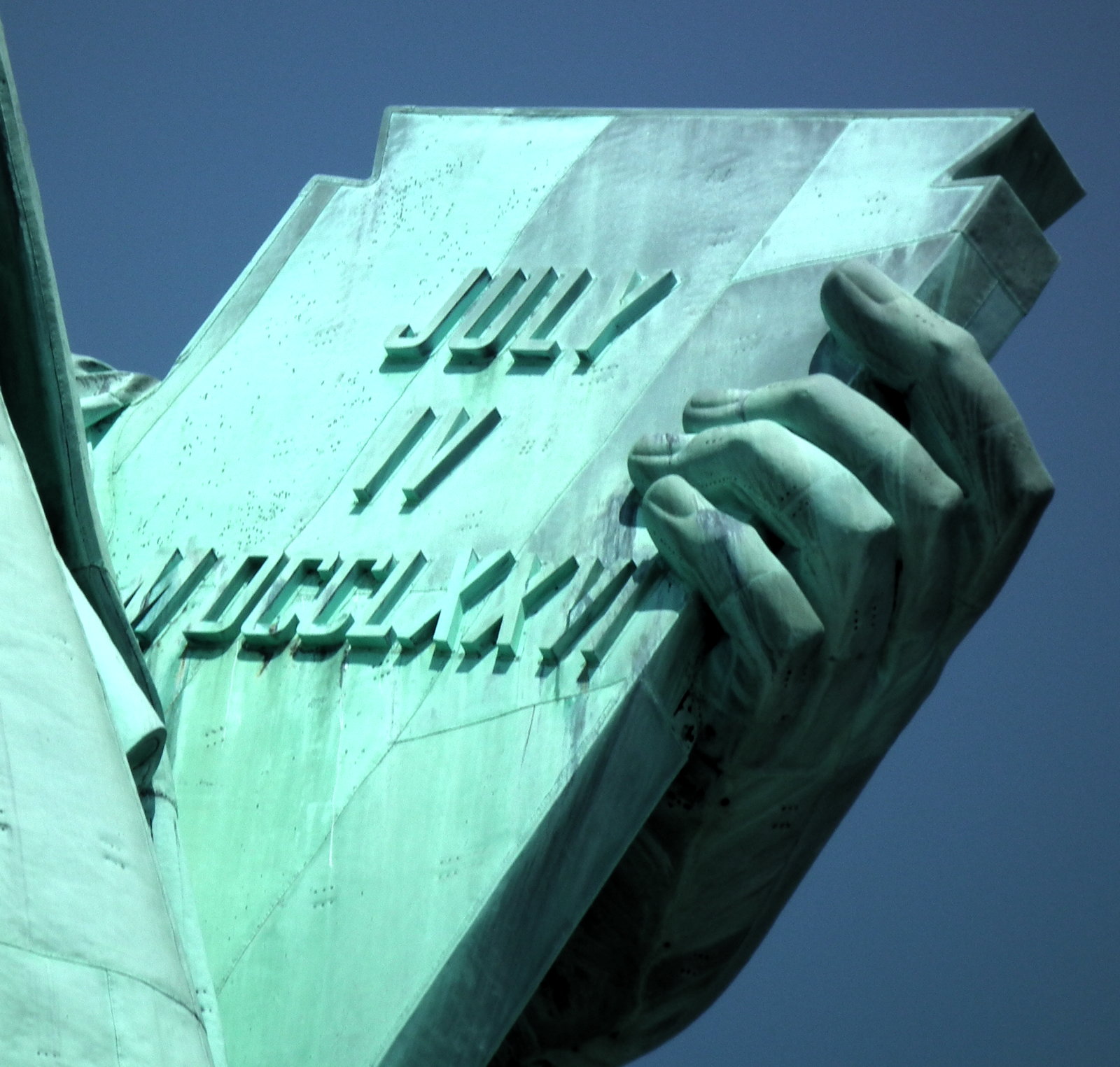 Statue of Liberty tablet: The tablet held by the Statue of Liberty, displaying “July IV MDCCLXXVI”.; Fourth of July; Independence Day; Statue of Liberty