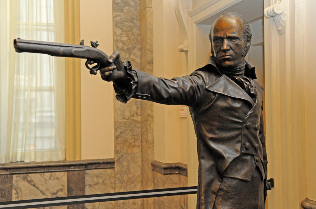 Aaron Burr dueling: Statue of Aaron Burr, with firearm extended.; Aaron Burr