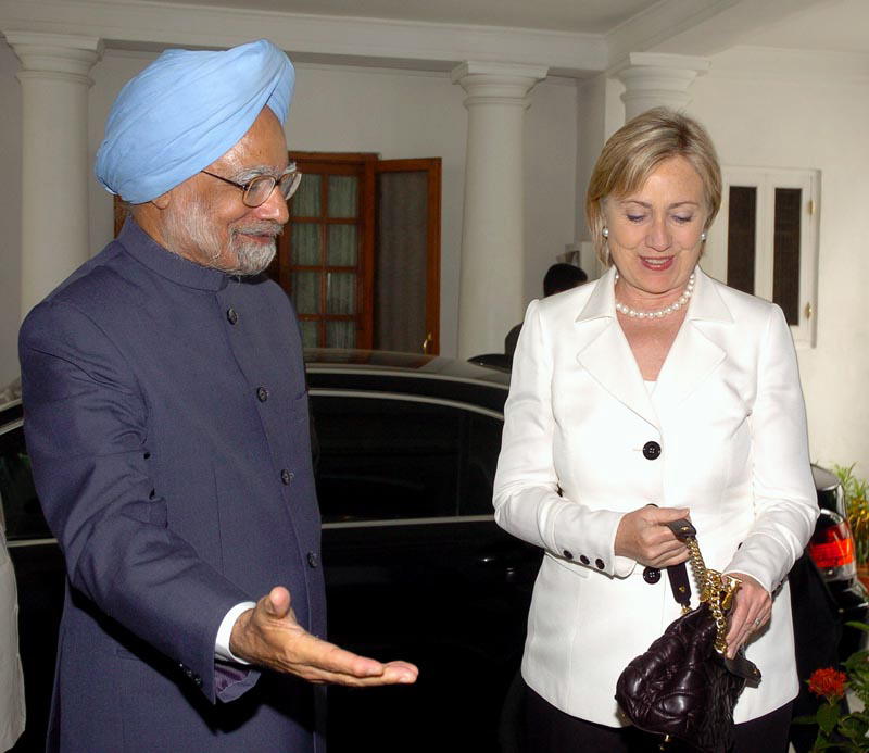 Secretary of State Hillary Clinton and Prime Minister Manmohan Singh: “Prime Minister Manmohan Singh greets U.S. Secretary of State Hillary Rodham Clinton upon her arrival at his residence in New Delhi, India July 20, 2009.”; India; Hillary Clinton; Manmohan Singh