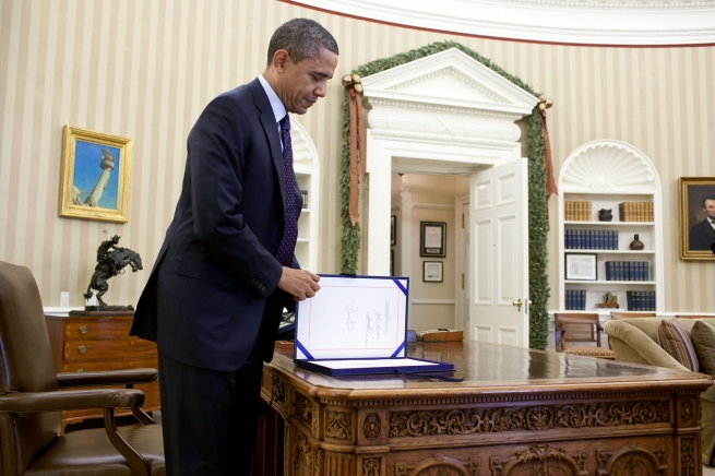 President Obama signs H.R. 3765