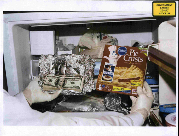 William Jefferson Freezer Piecrusts: “Cash found in freezer at Washington, D.C. home of Congressman William J. Jefferson of Louisiana. This photo was entered Wednesday 8 July 2009 as evidence showing what was seized on Aug. 3, 2005, from the freezer of the Washington home of then-Rep. William Jefferson, D-New Orleans. Jurors in the bribery trial of Jefferson, who lost his re-election bid last year, saw photos of the infamous frozen cash. It was wrapped in $10,000 increments and concealed in boxes of Pillsbury pie crust and Boca burgers.”; corruption; bribes; William J. Jefferson