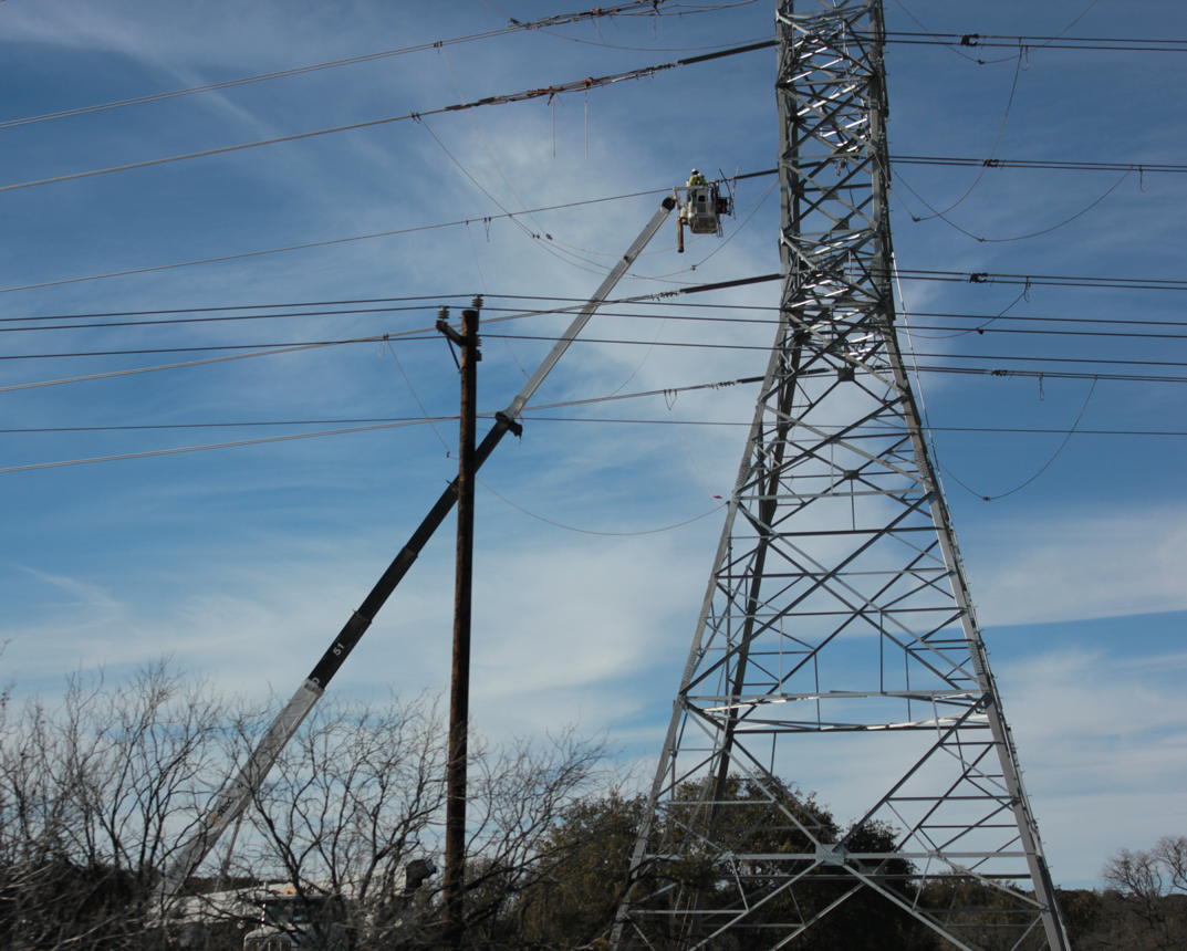 Electricity transmission tower erection on the U.S. Route 90 in Texas