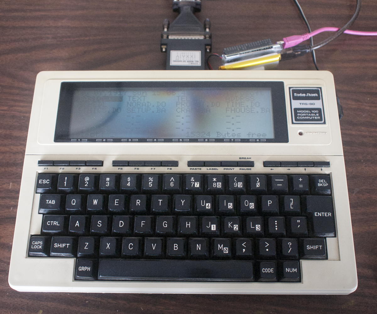 Linux on My Back 100: A C.H.I.P. Linux computer attached to the back of a TRS-80 Model 100 laptop.; Linux; TRS-80 Model 100