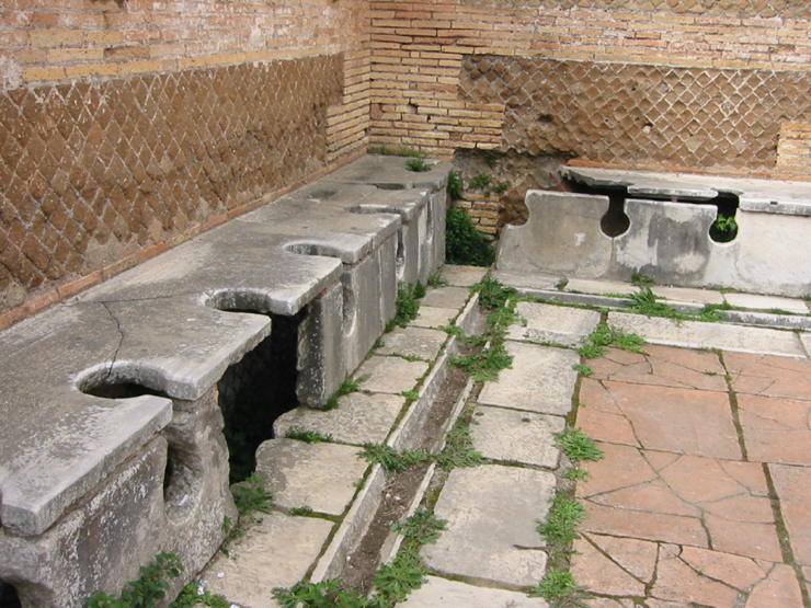 Ostia toilets: Ancient Roman latrines, from Ostia Antica.; Roman Empire; toilet