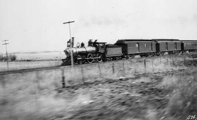 ATSF Passenger Train: “Passenger Train of the Atchison, Topeka and Santa Fe Railway, around 1895.”; rail