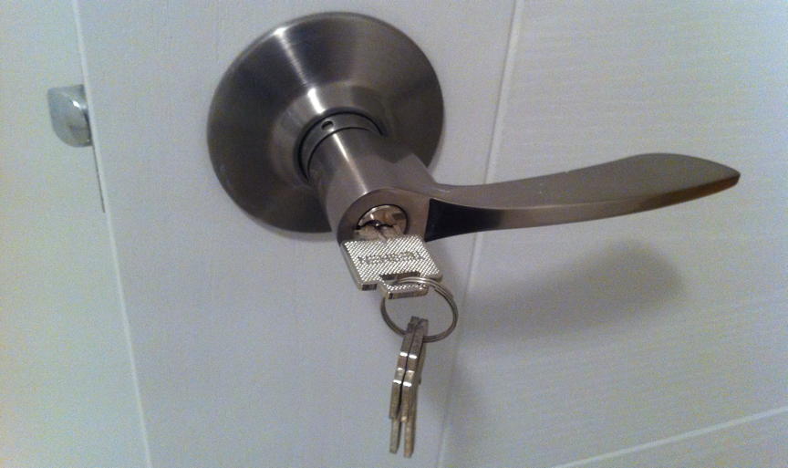 Door handle with key: “Stainless steel room door handle lock keys Oct-2011 HK Ip4.”; keys; locks