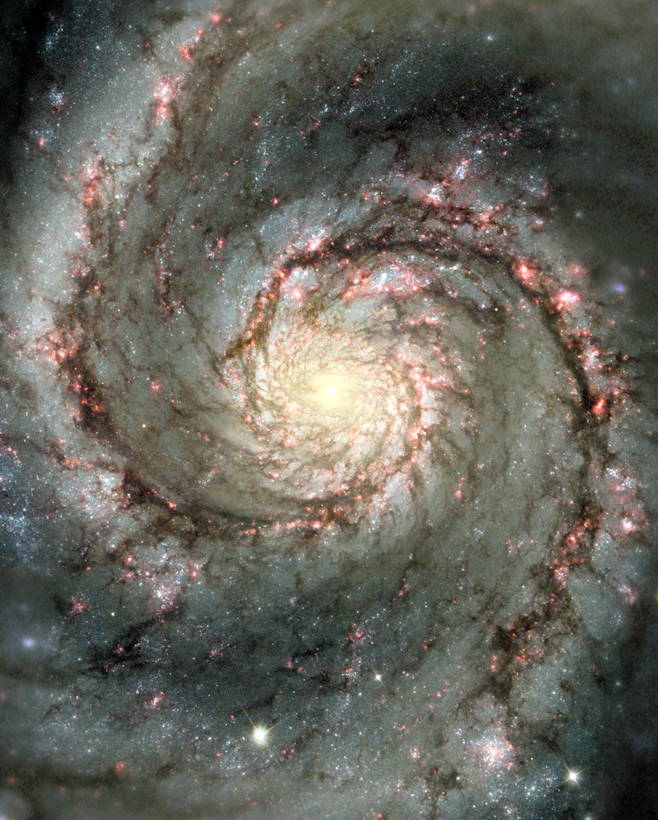 Whirlpool Galaxy: This Hubble composite image shows visible starlight as well as light from the emission of glowing hydrogen, which is associated with the most luminous young stars in the spiral arms.

The Whirlpool Galaxy, also known as M51 or NGC 5194, is having a close encounter with a nearby companion galaxy, NGC 5195, just off the upper edge of this image. The companion&#39;s gravitational pull is triggering star formation in the main galaxy, as seen in brilliant detail by numerous, luminous clusters of young and energetic stars. The bright clusters are highlighted in red by their associated emission from glowing hydrogen gas.; space; galaxies